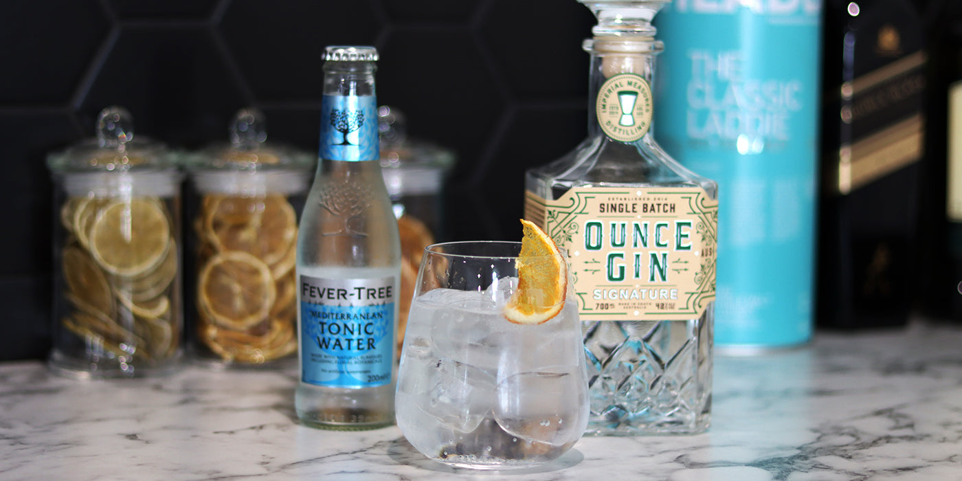 Local Ounce Gin served with best in class Fever-Tree Tonic and dehydrated citrus at KJ Barbers